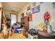 Cluttered bedroom with multiple items including antiques, toys, and books at 5642 N Highway 212, Covington, GA 30016