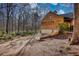 Exterior of a property with a visible driveway and a two-car garage at 5642 N Highway 212, Covington, GA 30016