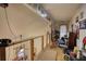 Hallway with unique wood flooring, various personal items, and a ceiling fan at 5642 N Highway 212, Covington, GA 30016