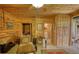 Comfortable living room with wood walls and comfortable seating at 5642 N Highway 212, Covington, GA 30016