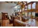 Open-concept living room with wood floors, natural light, and cozy seating at 5642 N Highway 212, Covington, GA 30016