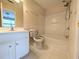 Full bathroom featuring a single sink vanity and a bathtub with a shower at 11780 Wellsley Way, Alpharetta, GA 30005