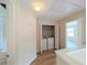 Convenient laundry room area with a washer and dryer inside a closet at 11780 Wellsley Way, Alpharetta, GA 30005