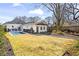 Wide view of a landscaped backyard, pool, and home exterior at 733 Cherokee Se Ave, Atlanta, GA 30315