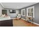 Bedroom featuring gray walls, a desk, a daybed and natural light at 733 Cherokee Se Ave, Atlanta, GA 30315