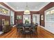 Elegant dining room features hardwood floors, stylish chandelier, and ample natural light, perfect for gatherings at 733 Cherokee Se Ave, Atlanta, GA 30315