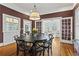 Elegant dining room features hardwood floors, a round table, and bright light fixture at 733 Cherokee Se Ave, Atlanta, GA 30315