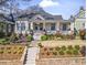 Traditional-style home showcasing a covered front porch, inviting entrance, and meticulously landscaped yard at 733 Cherokee Se Ave, Atlanta, GA 30315