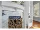 Close-up of an ornate fireplace with decorative tiles and a stylish mantel, adding character to the room at 733 Cherokee Se Ave, Atlanta, GA 30315