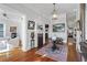 Elegant foyer with hardwood floors, decorative rug, and fireplace, creating a warm and inviting ambiance at 733 Cherokee Se Ave, Atlanta, GA 30315