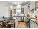 Stylish kitchen with stainless steel appliances, bar seating, and granite countertops at 733 Cherokee Se Ave, Atlanta, GA 30315
