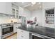 Updated kitchen boasting a stainless steel range and a large center island at 733 Cherokee Se Ave, Atlanta, GA 30315
