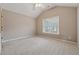 Spacious bedroom with vaulted ceiling and large window providing natural light at 4776 Trilogy Park Trl, Hoschton, GA 30548