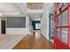 Inviting foyer with hardwood floors, a soaring ceiling, and a view of the staircase at 4776 Trilogy Park Trl, Hoschton, GA 30548