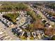 Aerial view of neighborhood highlighting the community layout and surrounding trees at 6439 Grey Fox Way, Riverdale, GA 30296