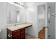 Bathroom features a vanity with dark wood cabinets and an open view of the home at 6439 Grey Fox Way, Riverdale, GA 30296