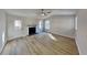 Bright living room offers modern ceiling fan and fireplace at 7021 Hillcrest Chase Ln, Austell, GA 30168