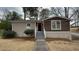 Charming single story home featuring a well-maintained front yard at 1815 Boulderview Se Dr, Atlanta, GA 30316