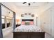 Bright bedroom featuring large window, ceiling fan, carpet, and neutral paint at 200 River Vista Dr # 736, Atlanta, GA 30339