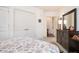Bedroom with a view of the doorway, dresser, and a large window at 200 River Vista Dr # 736, Atlanta, GA 30339