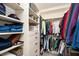 Spacious walk-in closet with ample shelving and hanging storage for organized living at 200 River Vista Dr # 736, Atlanta, GA 30339