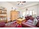 Spacious living room with hardwood floors, wooden furniture, a comfortable seating arrangement, and balcony access at 200 River Vista Dr # 736, Atlanta, GA 30339