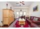 Inviting living room with hardwood floors, comfortable seating, natural light, and access to a private balcony at 200 River Vista Dr # 736, Atlanta, GA 30339
