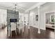 Open dining area featuring a glass table, fireplace, and an open view to a bedroom at 370 Sydney Se St, Atlanta, GA 30312