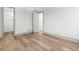 Bedroom with hardwood floors, walk-in closet and neutral paint at 375 Chattahoochee St, Roswell, GA 30075