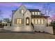 Charming home with a brick exterior, manicured lawn, and inviting front entrance at 375 Chattahoochee St, Roswell, GA 30075