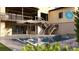 A backyard view of a pool with lounge chairs and a view of the house at 375 Chattahoochee St, Roswell, GA 30075