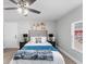 Comfortable bedroom with ceiling fan, two windows and stylish decor at 1190 Dallas Hwy, Villa Rica, GA 30180