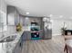 Modern kitchen featuring stainless steel appliances, gray cabinets and granite counter tops at 1190 Dallas Hwy, Villa Rica, GA 30180