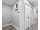 Functional laundry area featuring modern on-demand hot water system and neutral paint at 1190 Dallas Hwy, Villa Rica, GA 30180