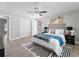Relaxing main bedroom with a ceiling fan, walk-in closet and stylish decor at 1190 Dallas Hwy, Villa Rica, GA 30180