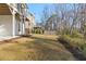 The fenced backyard has beautiful green grass and a wonderful place for children and pets to play at 2849 Parkridge Ne Dr, Brookhaven, GA 30319
