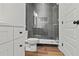 Modern bathroom with a glass-enclosed shower, contemporary tiles, and a stylish vanity with a white countertop at 2849 Parkridge Ne Dr, Brookhaven, GA 30319