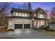Charming home with brick and white siding, a two-car garage, and a inviting front porch at 2849 Parkridge Ne Dr, Brookhaven, GA 30319