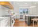 Well-appointed kitchen featuring modern appliances, granite countertops, and an island with seating at 2849 Parkridge Ne Dr, Brookhaven, GA 30319