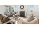 Cozy living room with a fireplace, built-in cabinets, and ample seating for relaxation and gatherings at 2849 Parkridge Ne Dr, Brookhaven, GA 30319