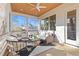 Cozy screened porch with a wood ceiling, white furniture, and a view of the backyard at 2849 Parkridge Ne Dr, Brookhaven, GA 30319