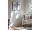 Bright sitting room featuring white walls, chairs, round table, artwork and a window at 2849 Parkridge Ne Dr, Brookhaven, GA 30319