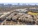 Stunning aerial view of the neighborhood with luxurious apartments and convenient parking deck, with the city skyline in the background at 400 17Th Nw St # 2025, Atlanta, GA 30363