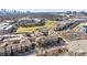 Wide aerial shot showcases the community's beautiful golf course and modern apartment buildings, near convenient parking areas at 400 17Th Nw St # 2025, Atlanta, GA 30363