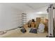 Unfinished basement area with convenient shelving, storage boxes and pet supplies at 400 17Th Nw St # 2025, Atlanta, GA 30363
