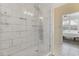 Walk-in shower featuring marble tile surround at 400 17Th Nw St # 2025, Atlanta, GA 30363