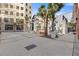Beautiful courtyard area featuring seating, palm trees, and landscaping in upscale community at 400 17Th Nw St # 2025, Atlanta, GA 30363