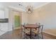 Cozy dining area with a table that seats four, a modern lighting fixture and hardwood floors at 400 17Th Nw St # 2025, Atlanta, GA 30363