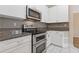 Modern kitchen featuring stainless steel appliances and granite countertops at 400 17Th Nw St # 2025, Atlanta, GA 30363
