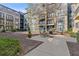 Community patio with outdoor seating and lush landscaping at 400 17Th Nw St # 2025, Atlanta, GA 30363